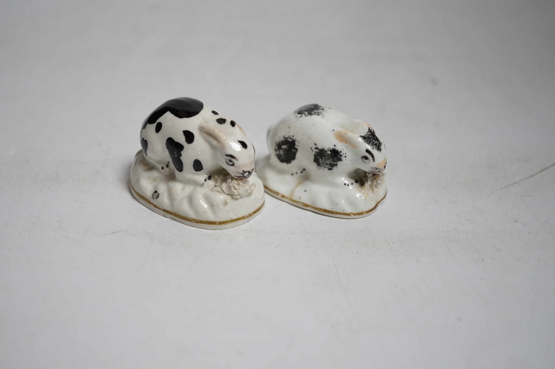 Two Staffordshire porcelain toy models of rabbits, c.1830–50, Provenance: Dennis G. Rice collection, 5 cms wide.